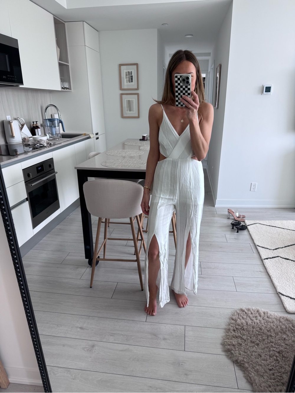 Mendocino White Sleeveless V-Neck Jumpsuit with Front Slits